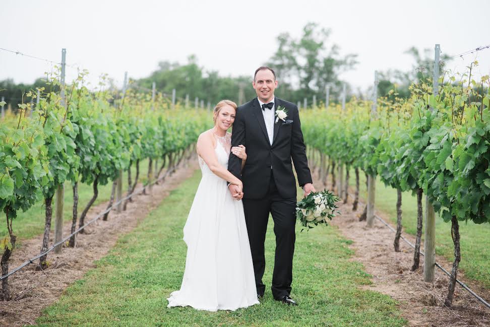 Couple elopement among the vineyard rows at Willow Creek Winery in Cape May
